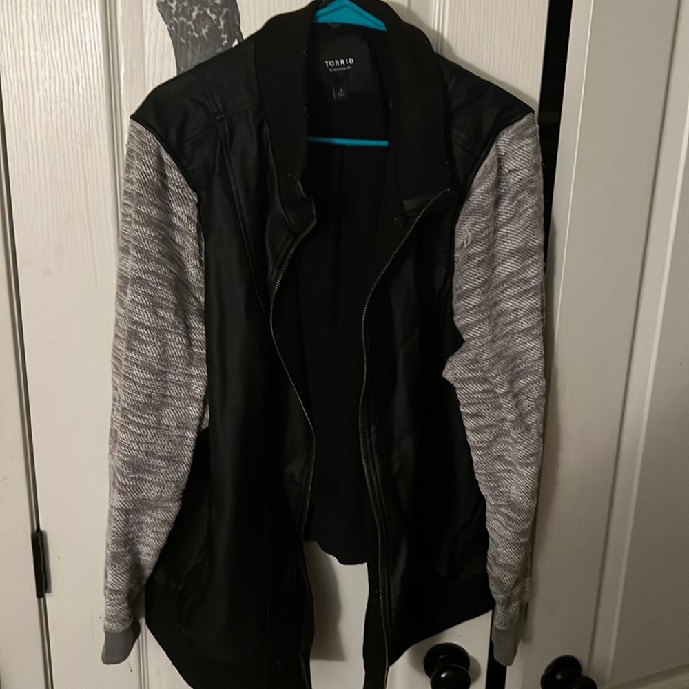 TORRID Black faux leather & marled grey terry bomber jacket.